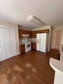 4201 Fowler Ridge Drive Raleigh, NC 27616 - Photo 11 of 27 a view of a kitchen with a sink oven cabinets and a window
