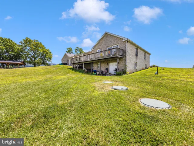 a view of an ocean and a yard