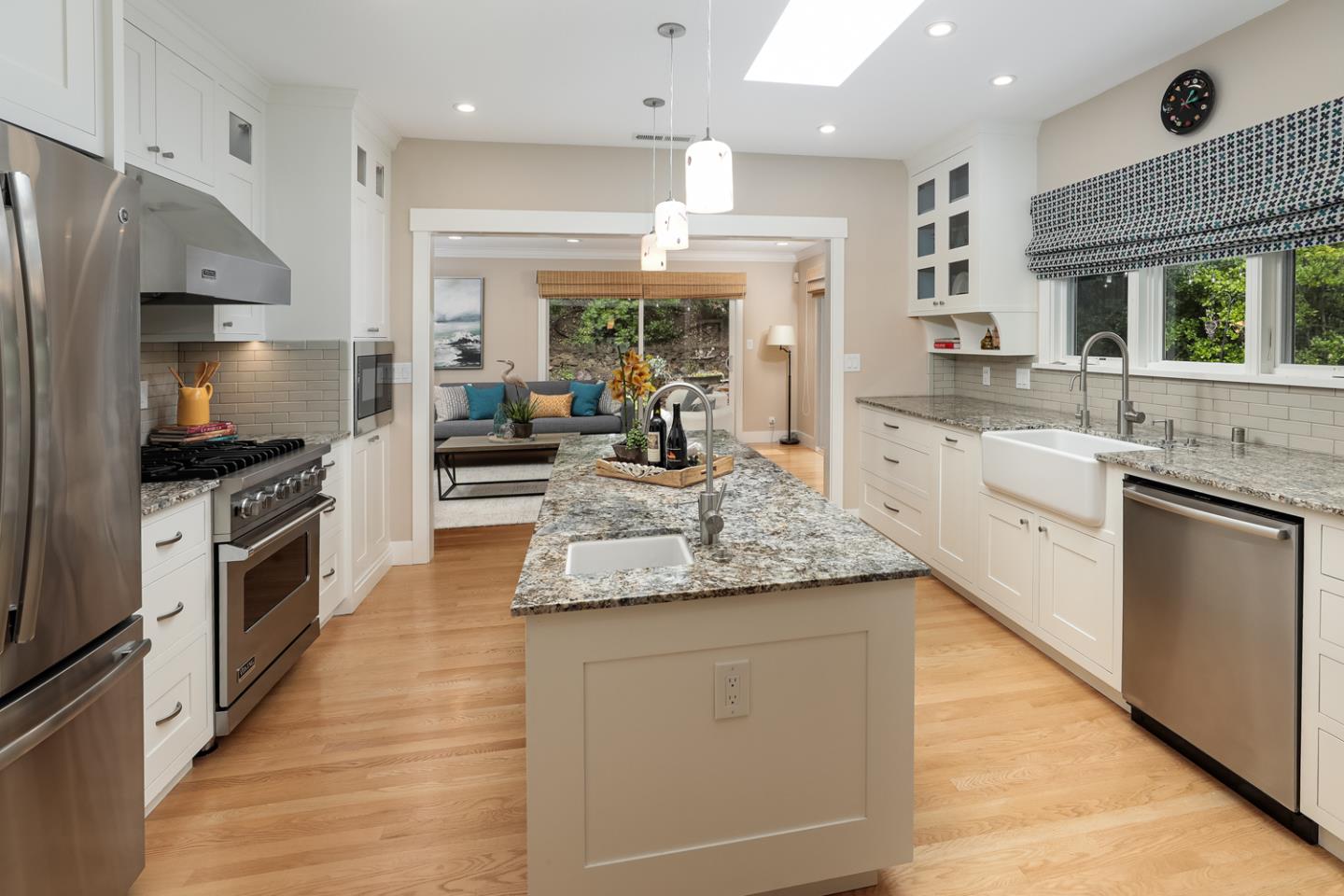 21781 Prospect Road Saratoga, CA 95070 - Photo 12 of 51 a large kitchen with granite countertop a large counter top stainless steel appliances and cabinets