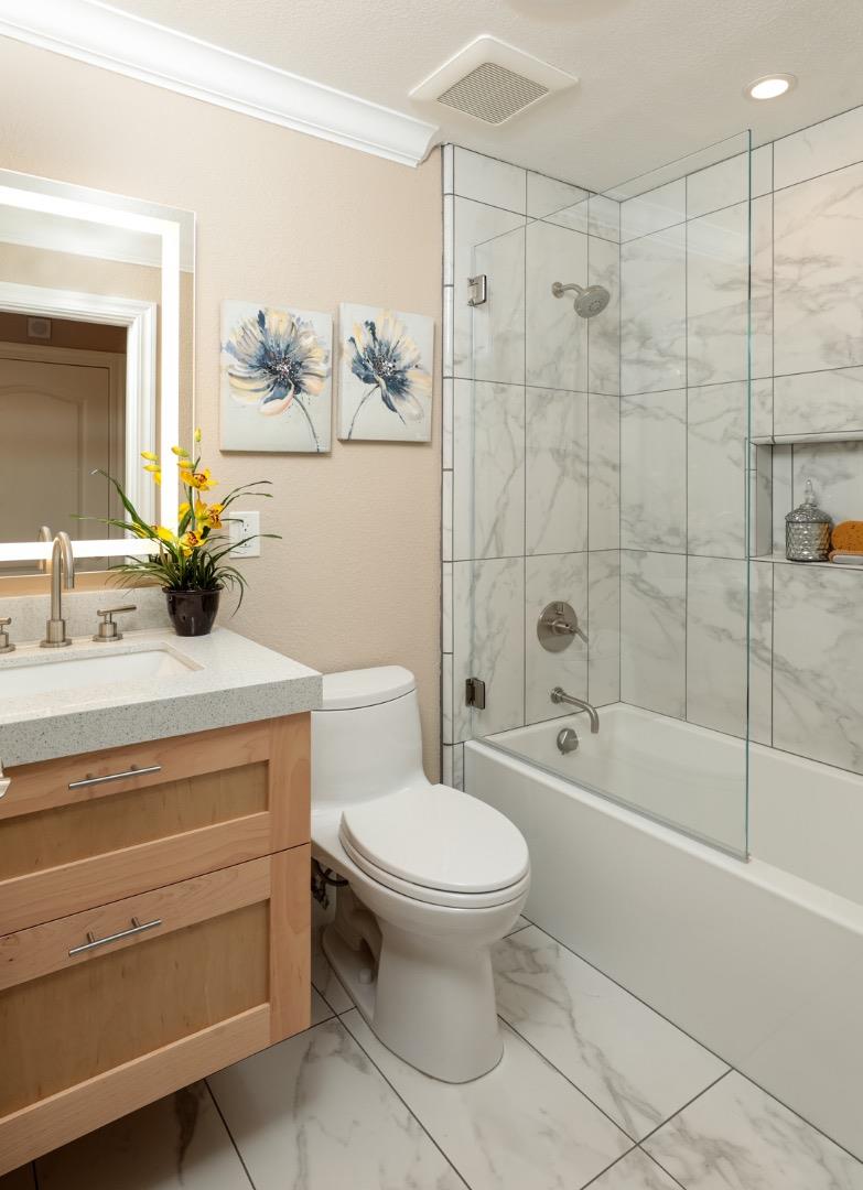 21781 Prospect Road Saratoga, CA 95070 - Photo 19 of 51 a bathroom with a sink a toilet and shower