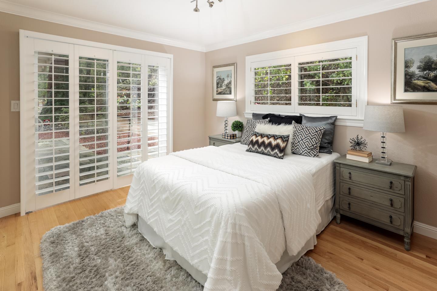 21781 Prospect Road Saratoga, CA 95070 - Photo 22 of 51 a bedroom with a bed and a large window