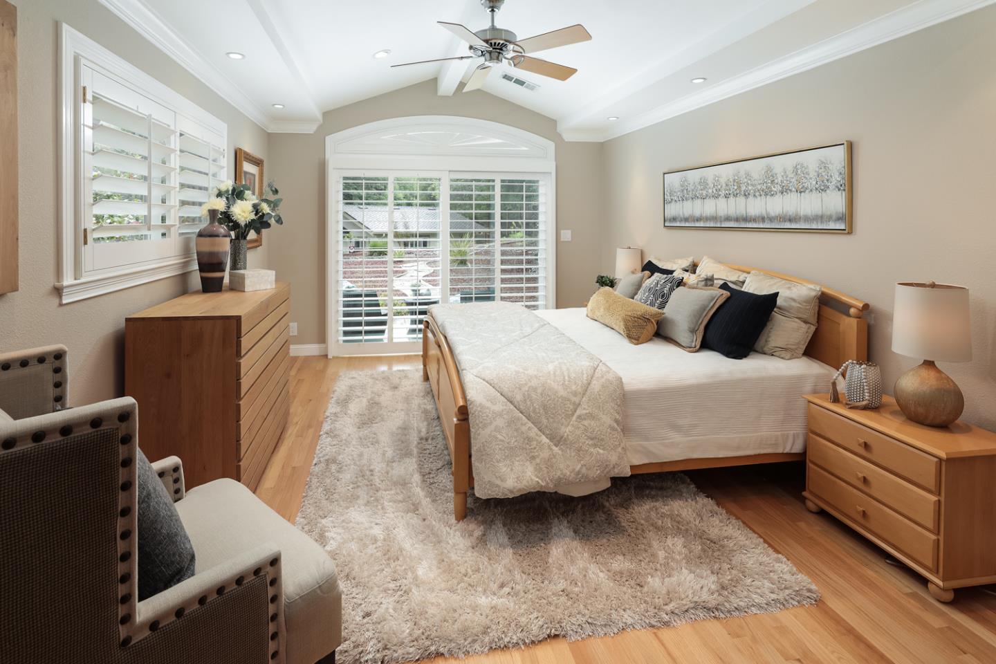 21781 Prospect Road Saratoga, CA 95070 - Photo 26 of 51 a bedroom with a bed and wooden floor