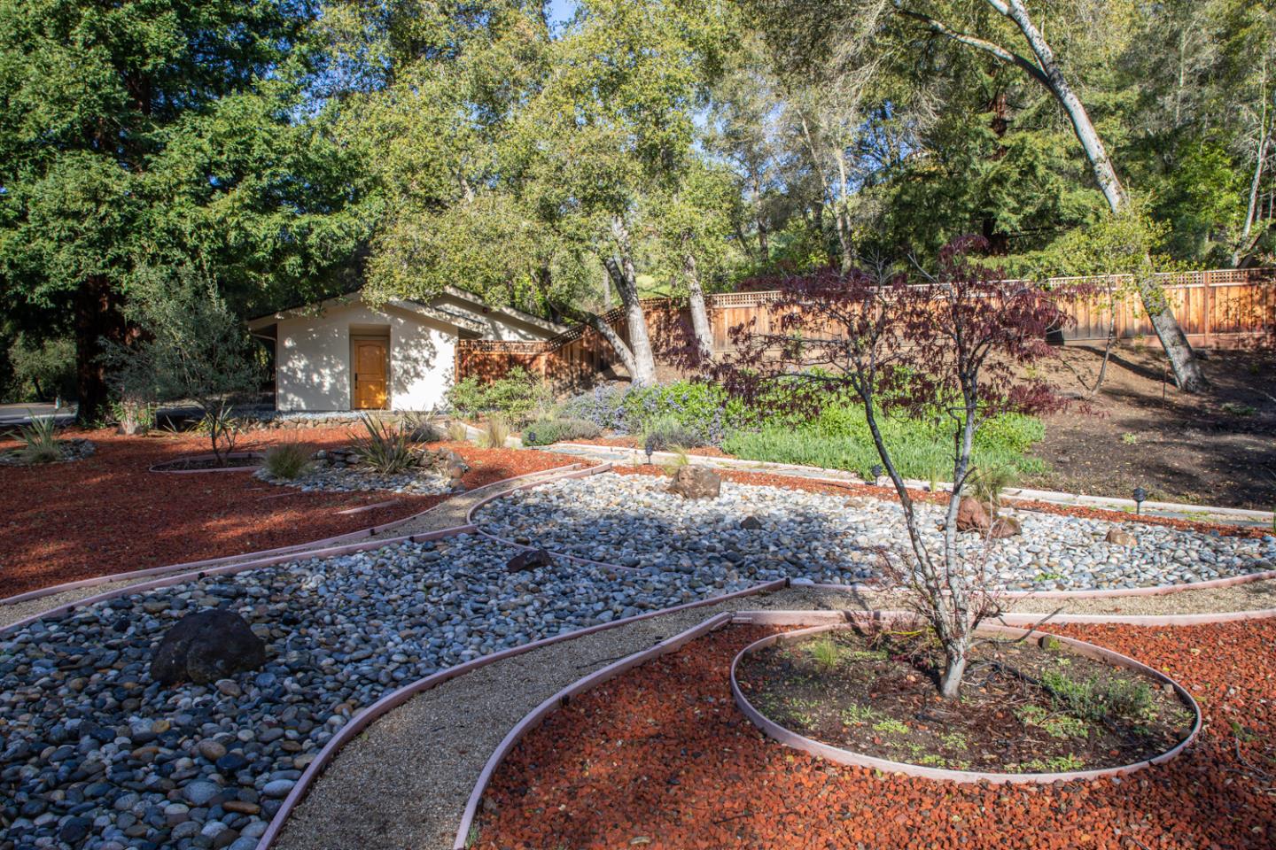 21781 Prospect Road Saratoga, CA 95070 - Photo 31 of 51 a view of a house with a backyard