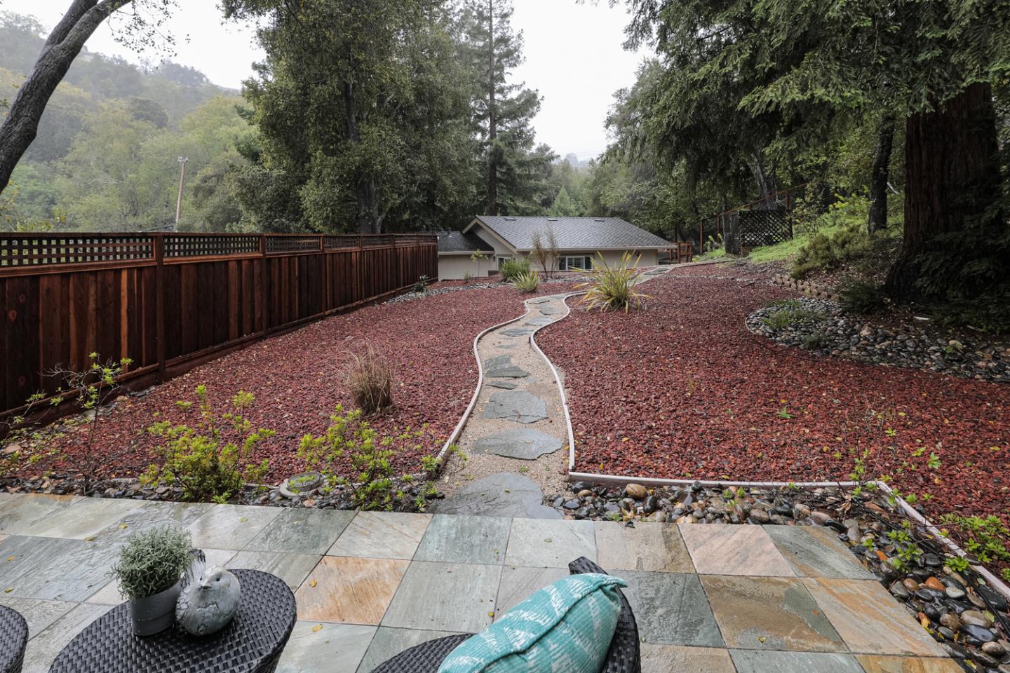 21781 Prospect Road Saratoga, CA 95070 - Photo 32 of 51 a view of a backyard with plants and trees