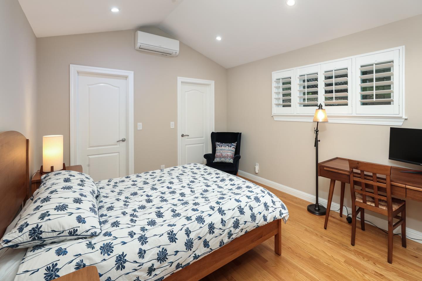21781 Prospect Road Saratoga, CA 95070 - Photo 36 of 51 a bedroom with a bed and a table