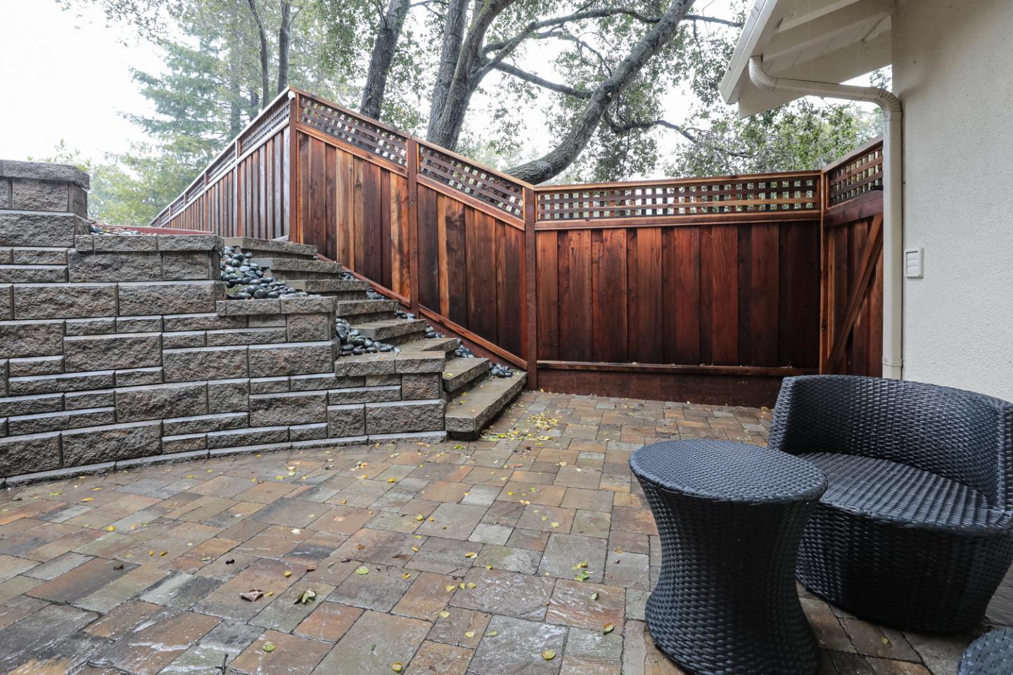21781 Prospect Road Saratoga, CA 95070 - Photo 38 of 51 a view of a chairs and table in backyard