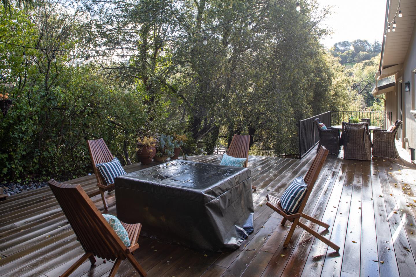 21781 Prospect Road Saratoga, CA 95070 - Photo 39 of 51 a backyard of a house with table and chairs