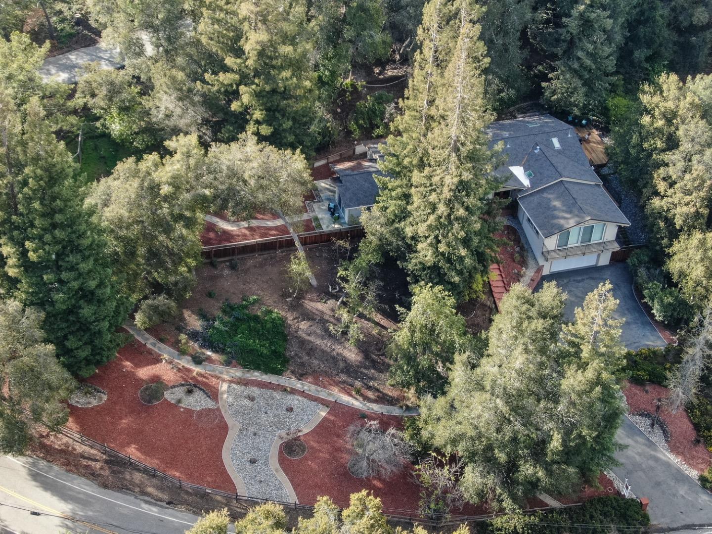 21781 Prospect Road Saratoga, CA 95070 - Photo 45 of 51 an aerial view of a house with a yard and trees all around