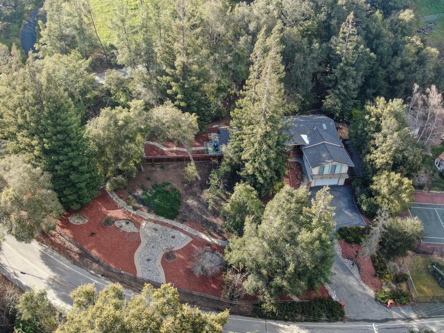 21781 Prospect Road Saratoga, CA 95070 - Photo 47 of 51 an aerial view of a house with a yard and greenery