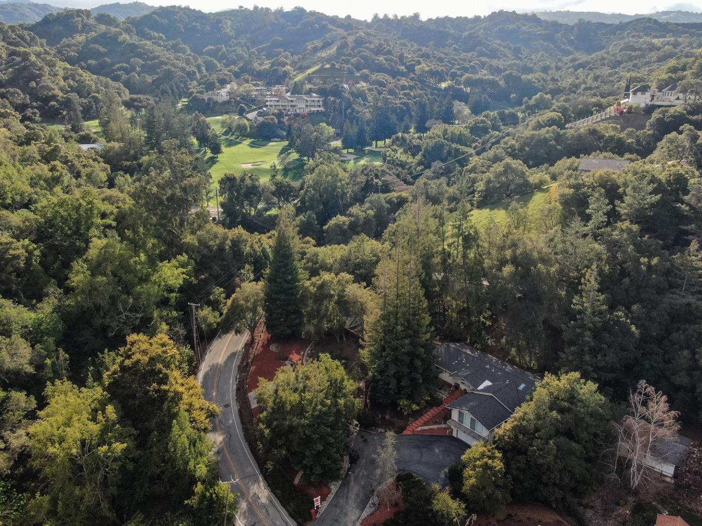 21781 Prospect Road Saratoga, CA 95070 - Photo 49 of 51 an aerial view of houses covered in trees