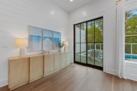 a bathroom with a shower sink and mirror