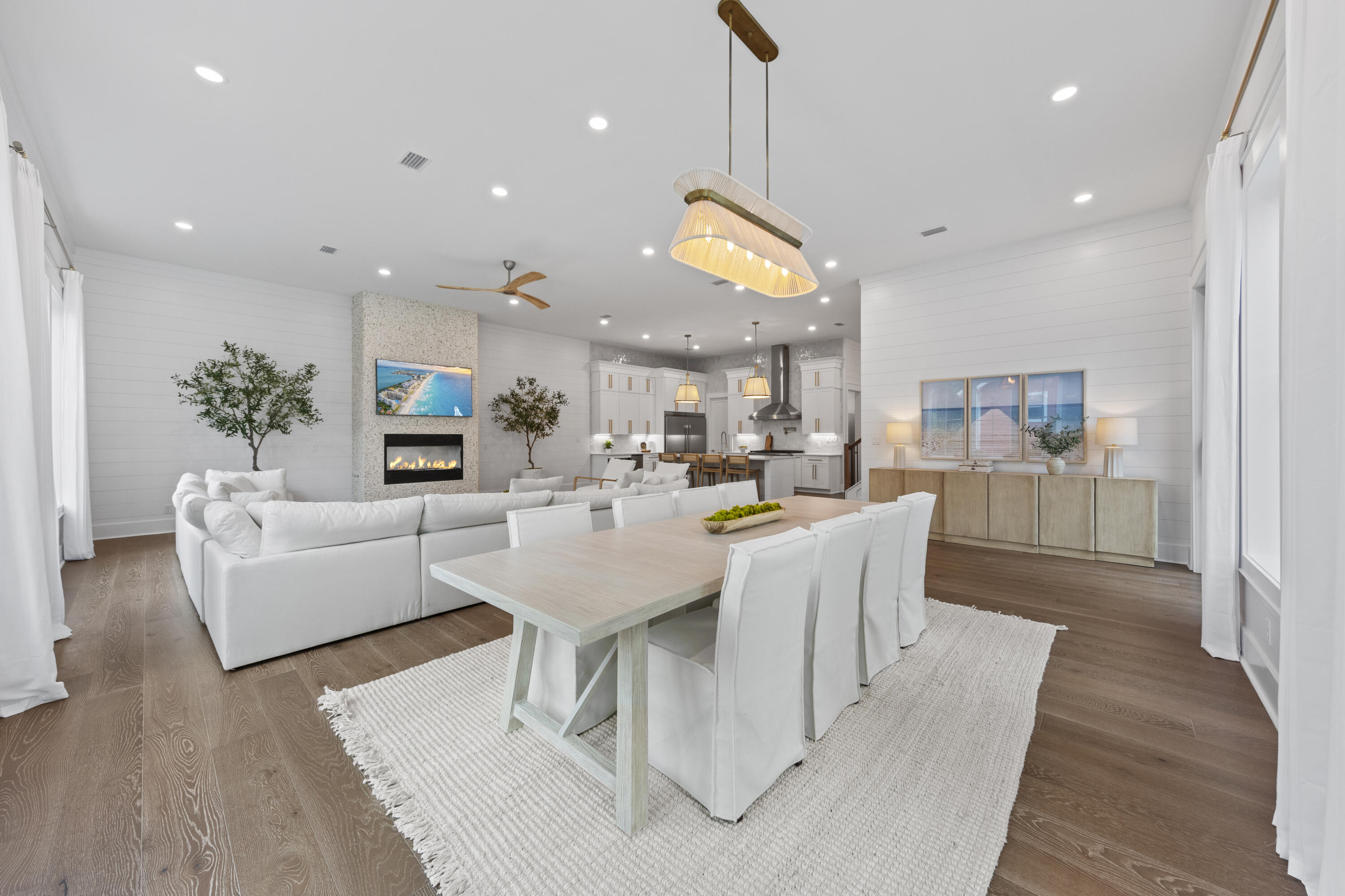 154 Maple Street Santa Rosa Beach, FL 32459 - Photo 15 of 56 an open kitchen with a table and chairs