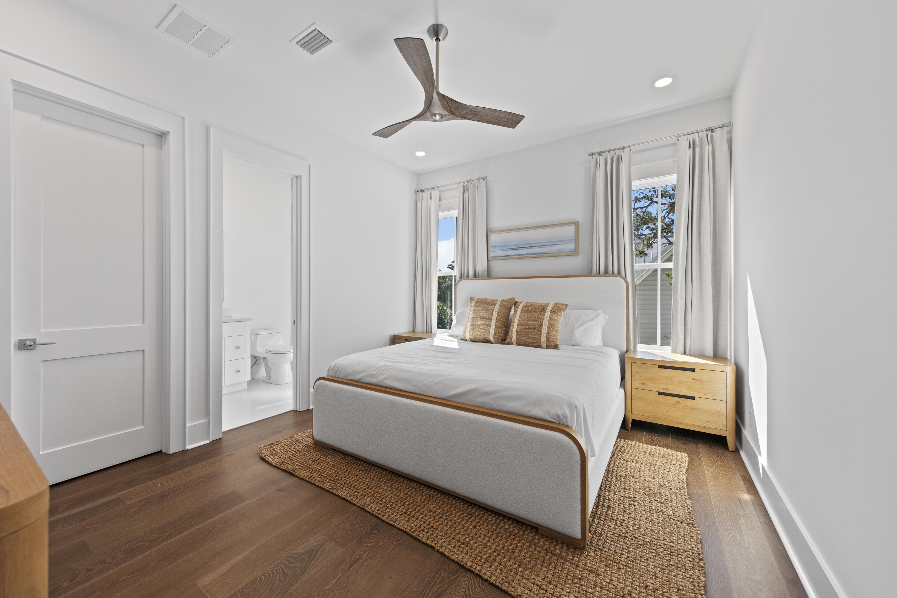 154 Maple Street Santa Rosa Beach, FL 32459 - Photo 34 of 56 a bedroom with a bed and a window