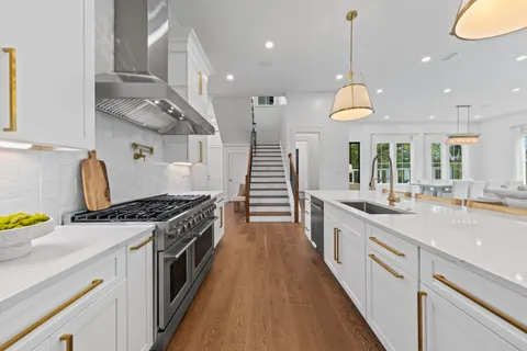 a view of a kitchen with furniture and window