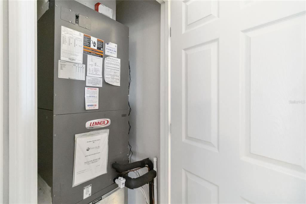 3566 Southern Cross Loop Kissimmee, FL 34744 - Photo 27 of 32 a view of a hallway with bathroom