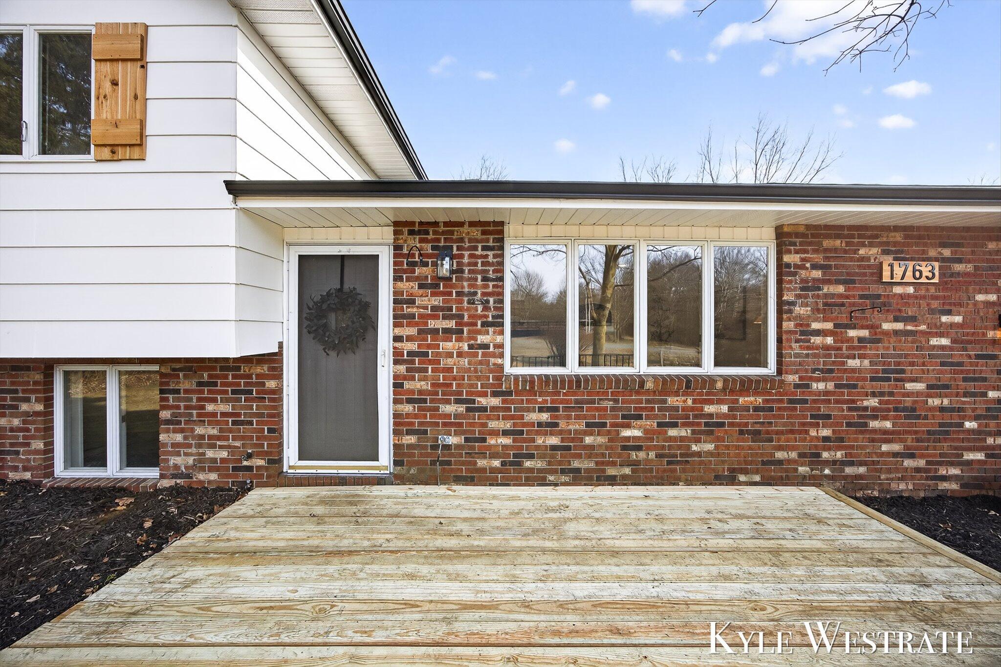 1763 East Pontaluna Road Spring Lake, MI 49456 - Photo 4 of 32 03-K1J11252-Edit