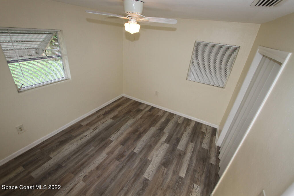 114 1st Street Merritt Island, FL 32953 - Photo 14 of 21 a view of room with window
