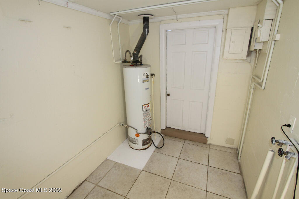 114 1st Street Merritt Island, FL 32953 - Photo 19 of 21 a view of a room with gym equipment