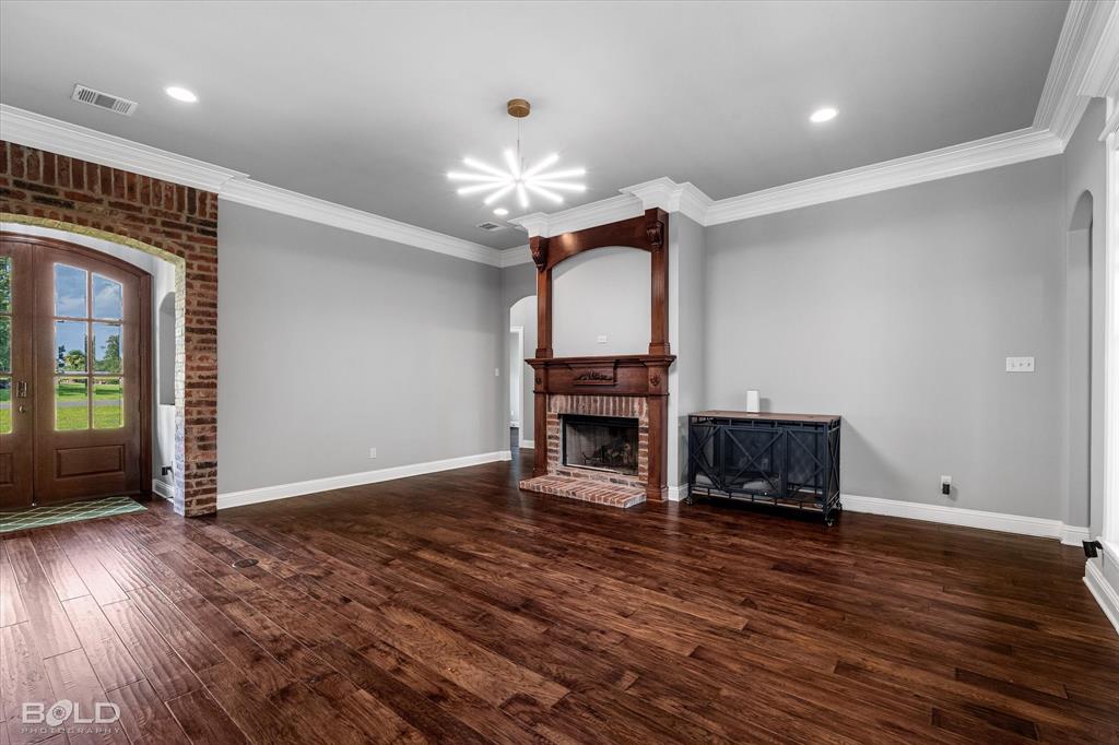 2220 Forest Hills Boulevard Haughton, LA 71037 - Photo 10 of 40 Hardwood-style flooring throughout