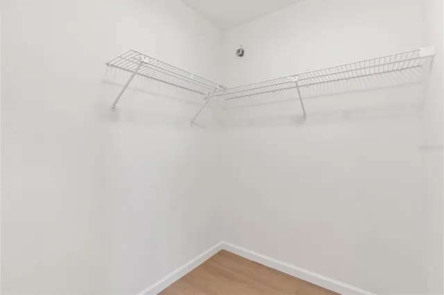 a view of a room with racks on the wall