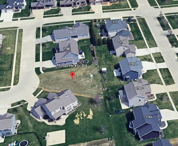 1766 Hicksii Road Normal, IL 61761 - Photo 6 of 8 an aerial view of residential houses with outdoor space