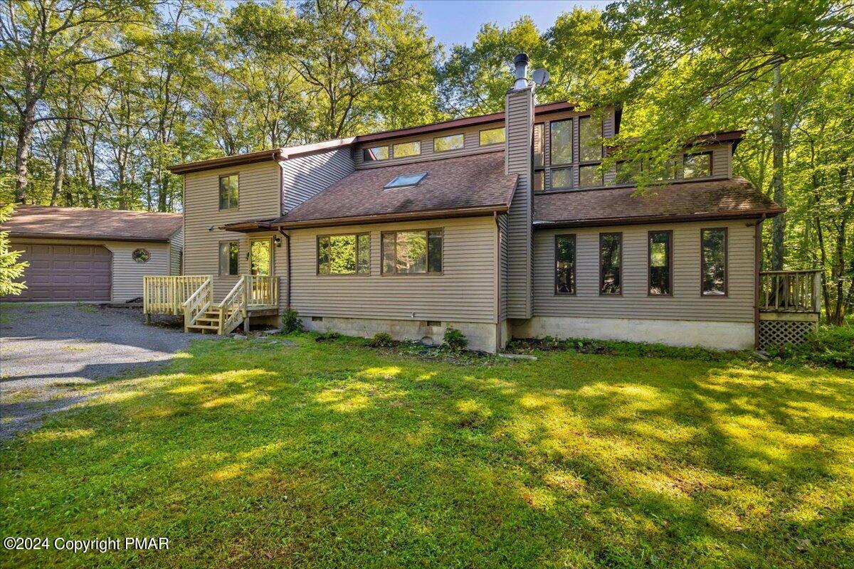 1182 Coolbaugh Road East Stroudsburg, PA 18302 - Photo 2 of 53 a view of a house with a yard
