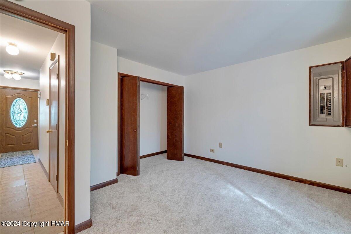 1182 Coolbaugh Road East Stroudsburg, PA 18302 - Photo 33 of 53 an empty room with windows and closet