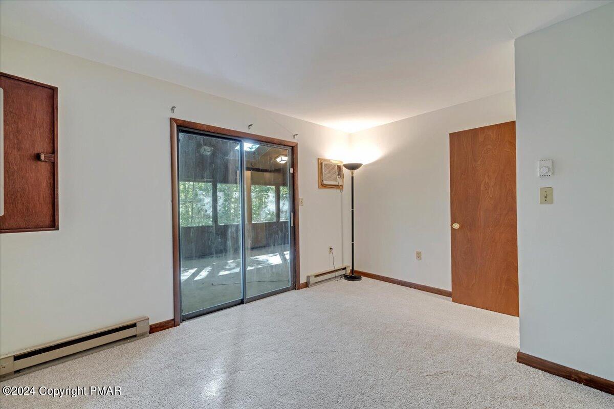 1182 Coolbaugh Road East Stroudsburg, PA 18302 - Photo 34 of 53 a view of an empty room with glass door