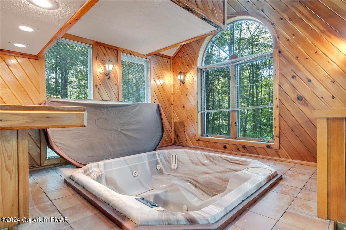 1182 Coolbaugh Road East Stroudsburg, PA 18302 - Photo 39 of 53 a bath tub sitting in front of a window
