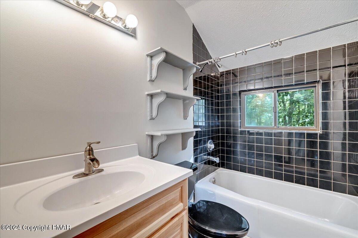 1182 Coolbaugh Road East Stroudsburg, PA 18302 - Photo 43 of 53 a bathroom with a sink toilet and bathtub