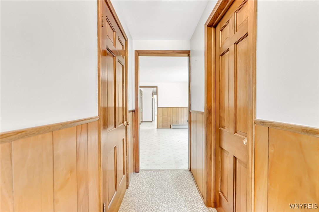 6 Impala Parkway Lancaster, NY 14086 - Photo 21 of 49 Hallway from laundry room to family room and kitch
