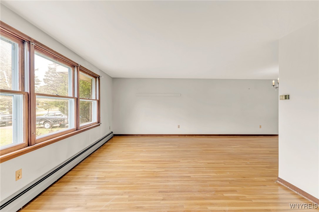 6 Impala Parkway Lancaster, NY 14086 - Photo 22 of 49 Front living room with beautiful hardwood floors