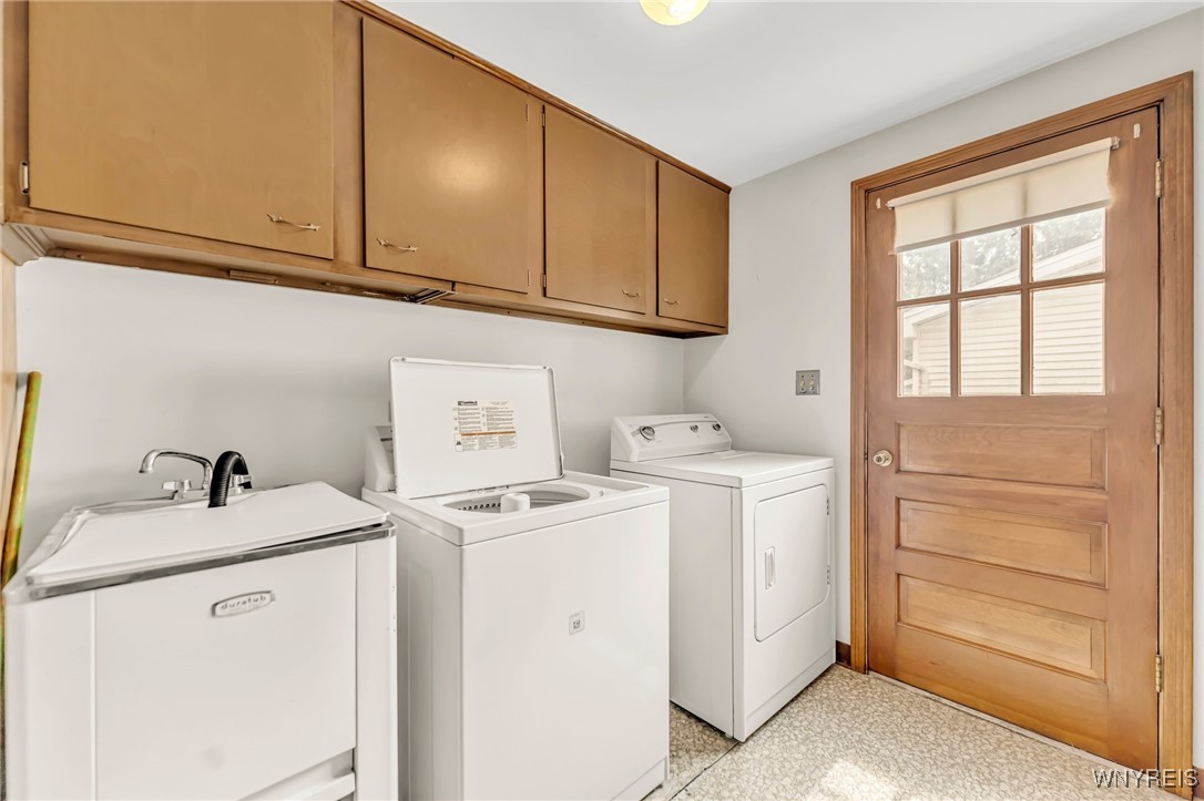 6 Impala Parkway Lancaster, NY 14086 - Photo 33 of 49 Laundry room with service door to side yard