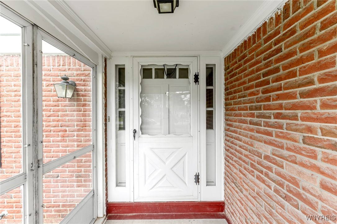 6 Impala Parkway Lancaster, NY 14086 - Photo 6 of 49 Front enclosed porch