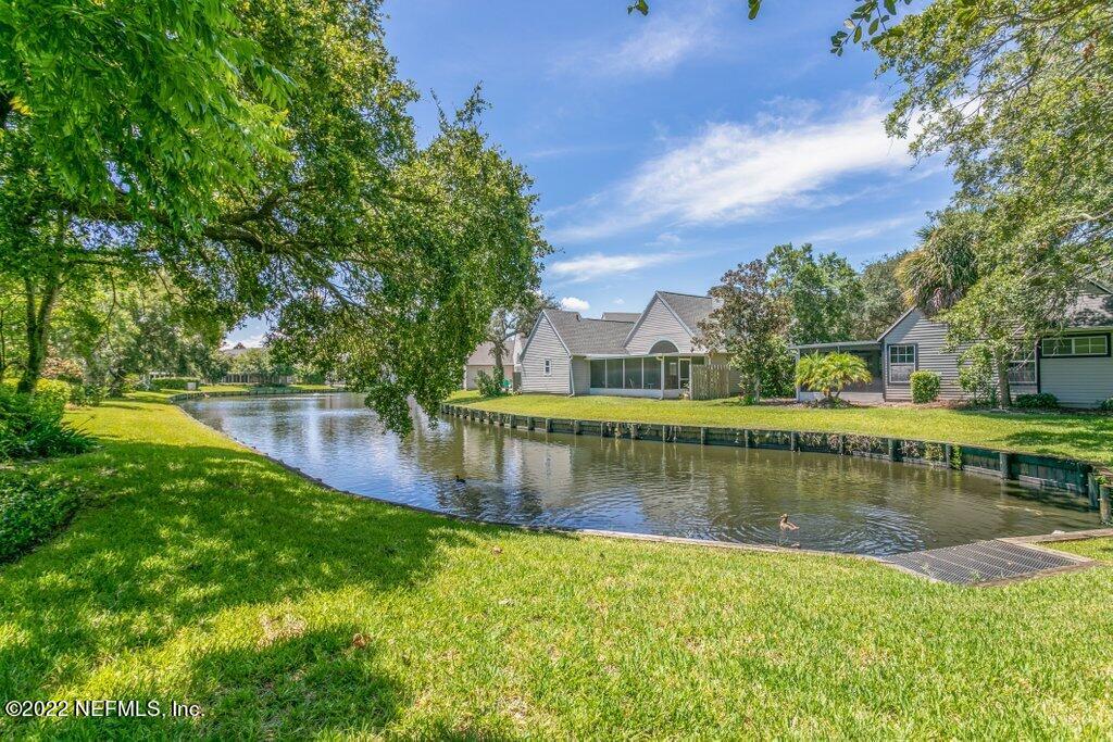 409 Village Drive St. Augustine, FL 32084 - Photo 37 of 75 a view of a lake with houses