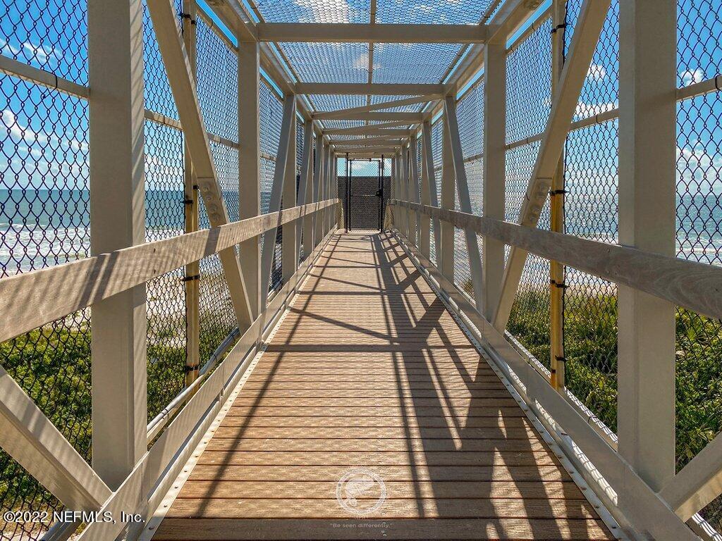 409 Village Drive St. Augustine, FL 32084 - Photo 47 of 75 a view of balcony with wooden floor