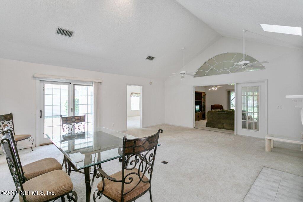 409 Village Drive St. Augustine, FL 32084 - Photo 5 of 75 a view of a livingroom with furniture and window