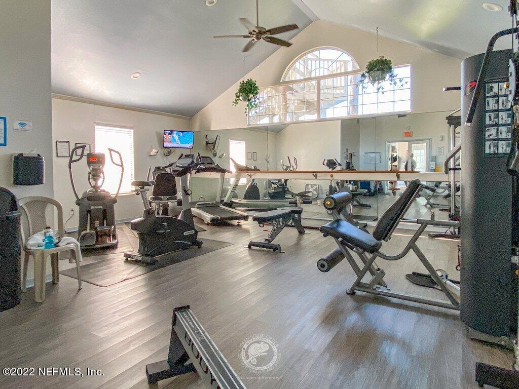 409 Village Drive St. Augustine, FL 32084 - Photo 54 of 75 a living room with furniture and a large window