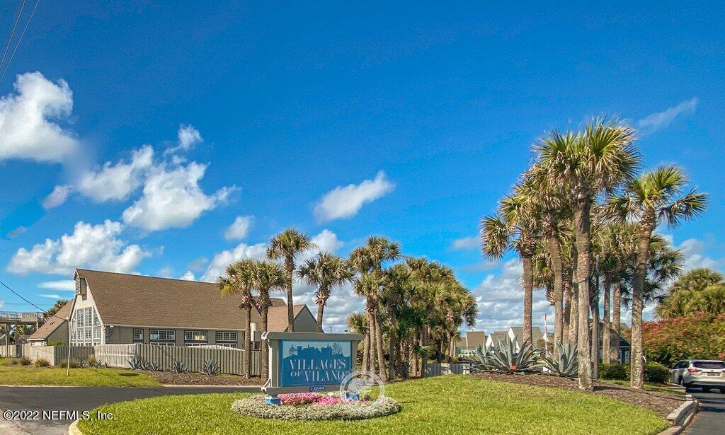 409 Village Drive St. Augustine, FL 32084 - Photo 74 of 75 a view of a house with a yard