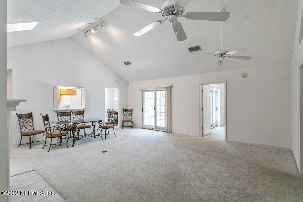 409 Village Drive St. Augustine, FL 32084 - Photo 10 of 75 a view of a livingroom with furniture and a window