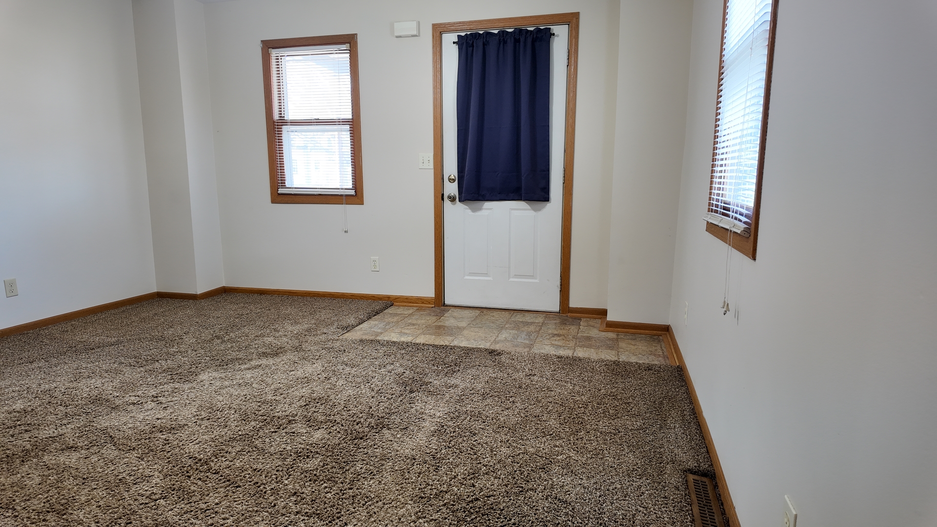 126 Prairie Street Genoa, IL 60135 - Photo 11 of 24 an empty room with windows