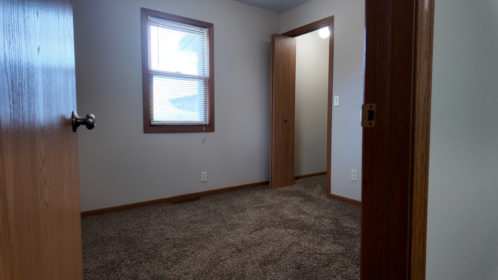 126 Prairie Street Genoa, IL 60135 - Photo 12 of 24 an empty room with windows and closet