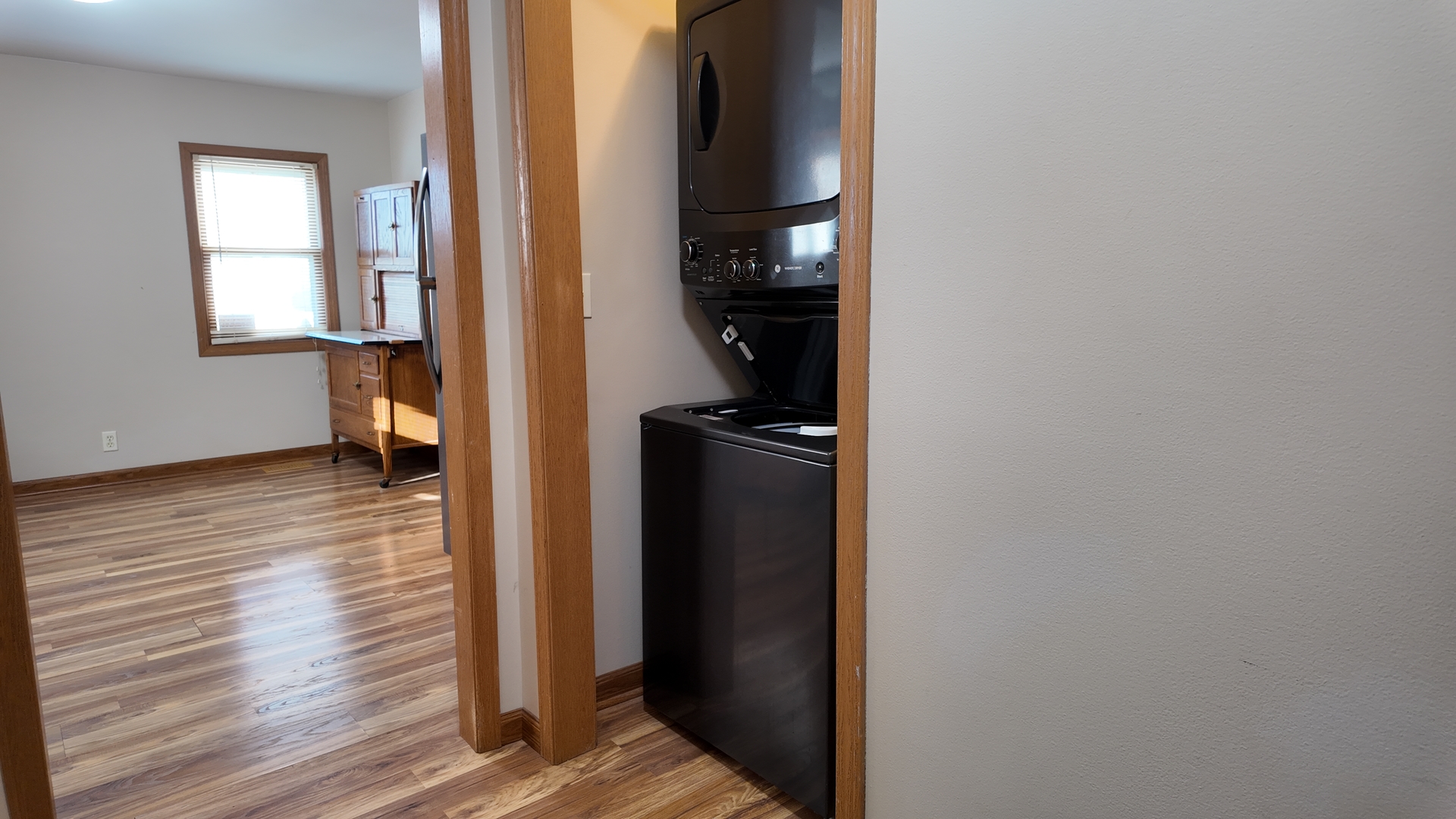 126 Prairie Street Genoa, IL 60135 - Photo 14 of 24 a view of a closet with wooden floor