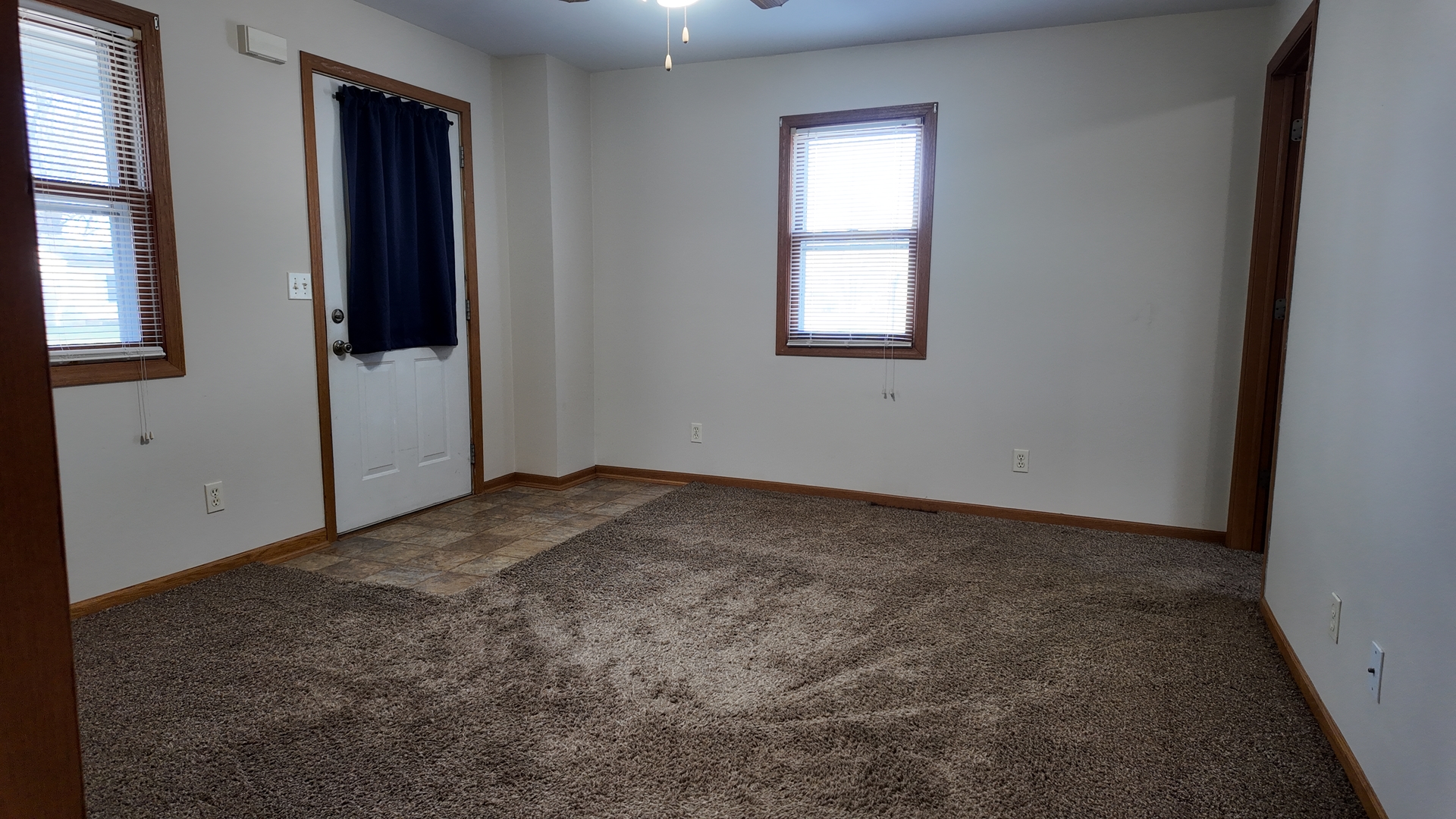 126 Prairie Street Genoa, IL 60135 - Photo 20 of 24 an empty room with windows