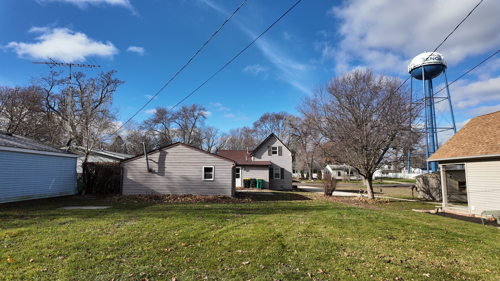 126 Prairie Street Genoa, IL 60135 - Photo 2 of 24 a view of a house with a yard