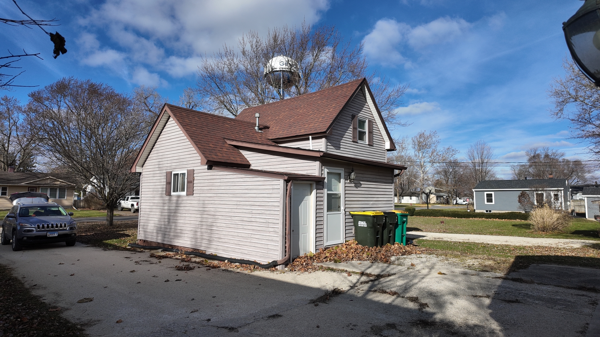 126 Prairie Street Genoa, IL 60135 - Photo 5 of 24 a house view with a outdoor space