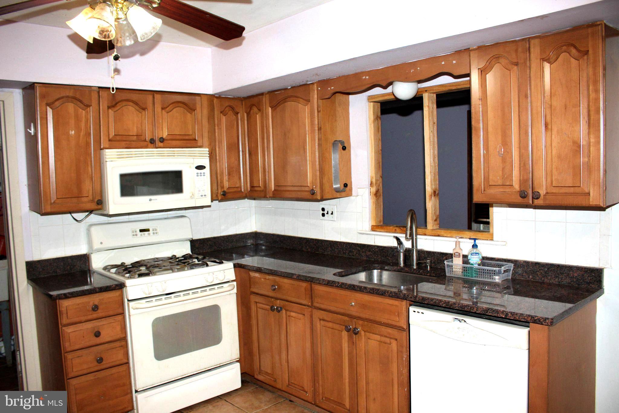 146 Oakmont Road Clementon, NJ 08021 - Photo 11 of 61 Warm wooden kitchen with modern charm.
