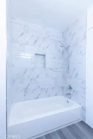 a bathroom with a bathtub