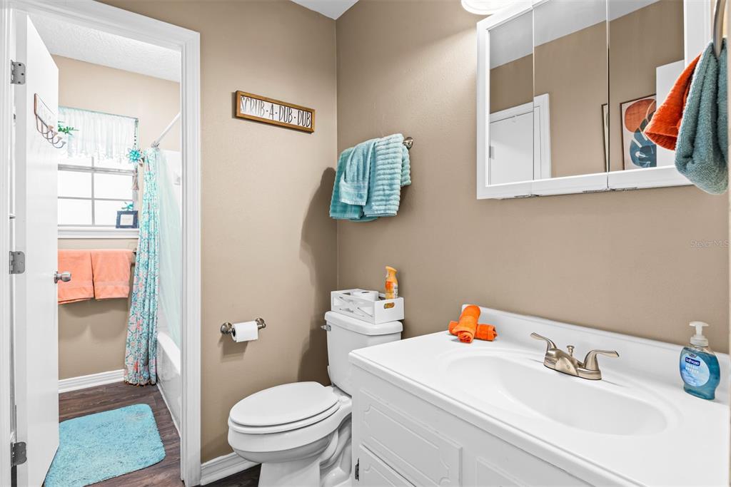 1040 Jocelin Road Pensacola, FL 32506 - Photo 21 of 46 a bathroom with a sink and a toilet