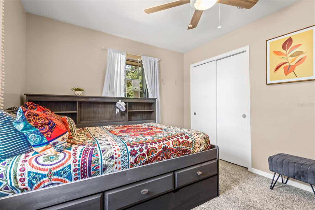 1040 Jocelin Road Pensacola, FL 32506 - Photo 25 of 46 a bedroom with a bed and window